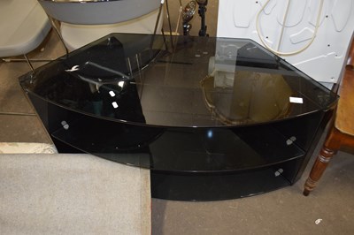 Lot 761 - A black glass television cabinet