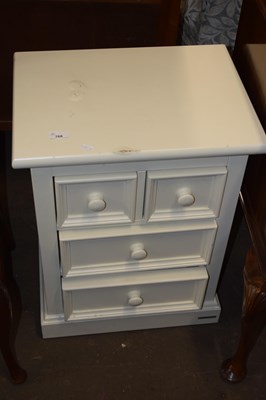 Lot 768 - A cream painted modern four drawer chest