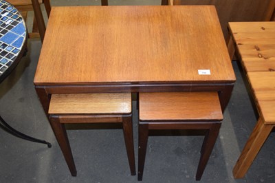 Lot 794 - Nest of three mid Century teak tables