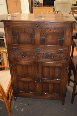 Lot 801 - 20th Century oak drinks cabinet possibly by...