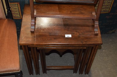 Lot 808 - A nest of three oak tables