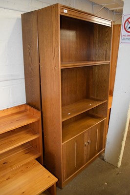 Lot 814 - A pair of modern oak finish bookcase cabinets