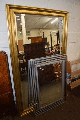 Lot 817 - A large modern rectangular wall mirror with...