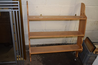 Lot 818 - A pine shelf unit