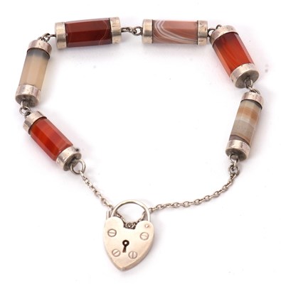 Lot 236 - An agate bracelet, the faceted barrel shape...