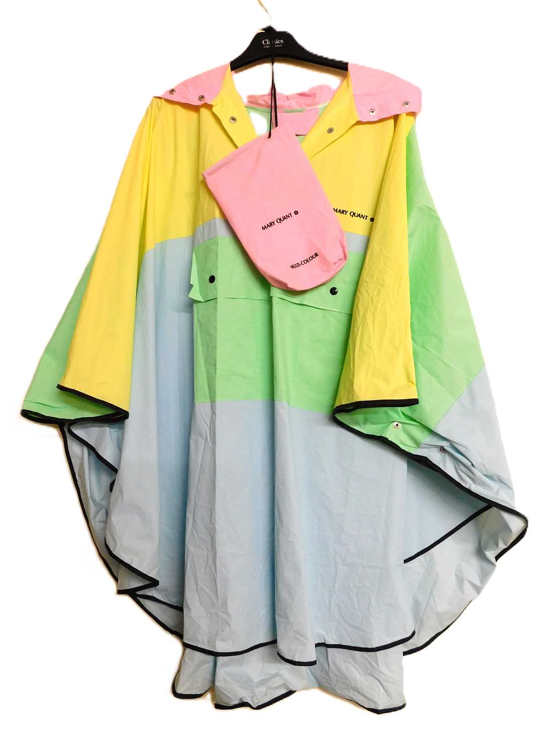 Lot 61 - A Mary Quant PVC hooded rain poncho, in pastel...
