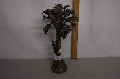 Lot 37 - Unusual cast bronze model of a figure climbing...