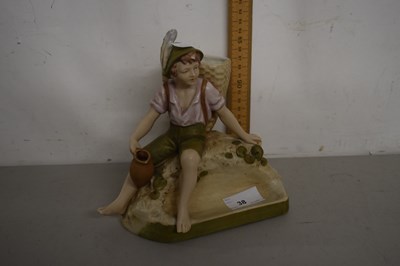 Lot 38 - Royal Dux porcelain figure of a grape picker