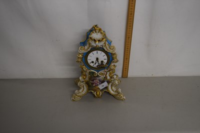 Lot 76 - French porcelain cased mantel clock, the face...