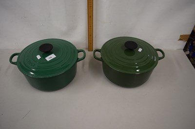 Lot 152 - Two green Le Creuset double handled cooking pots