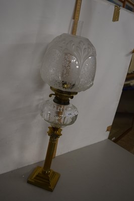 Lot 174 - Early 20th century oil lamp with brass...