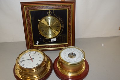 Lot 208 - Modern ship's brass cased clock and barometer...