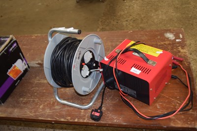 Lot 1032 - Battery trickle charger together with an...