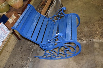 Lot 1038 - Cast metal and wood outdoor rocking chair