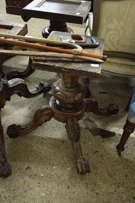 Lot 317 - Victorian walnut loo table base on four carved...