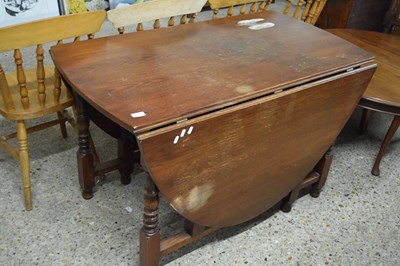 Lot 324 - Oak drop leaf dining table