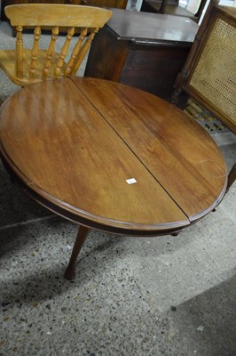 Lot 325 - Mahogany circular coffee table formed in two...