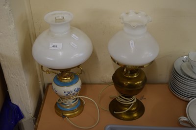 Lot 652 - Two vintage oil lamps converted to electricity