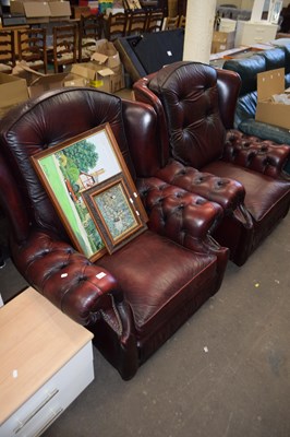 Lot 780 - Pair of red leather Chesterfield style wing...