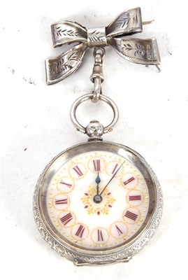 Lot 238 - A white metal lady's pocket watch with silver...