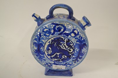 Lot 316 - A pottery flask of circular form, a blue and...