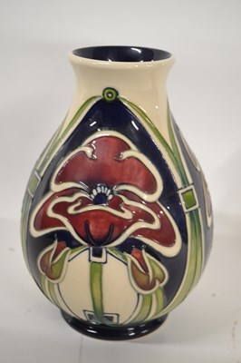 Lot 284 - A Moorcroft vase with tubelined Art Nouveau...