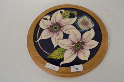 Lot 328 - A Moorcroft plaque in wooden frame with...