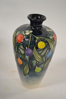 Lot 289 - A Moorcroft vase with tubelined Christmas...