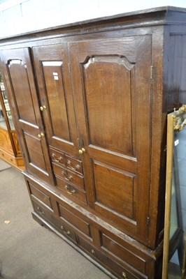 Lot 503 - A George III oak housekeepers cupboard with...