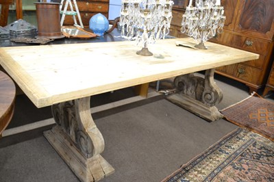 Lot 512 - A large stripped pine refectory style dining...