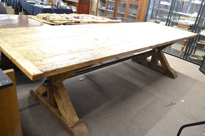 Lot 526 - A very large pine refectory style dining table,...