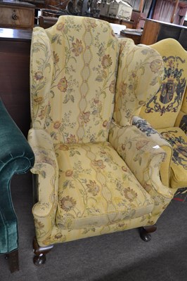 Lot 532 - A George III wing back armchair with short...