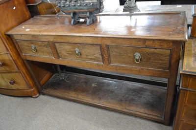 Lot 550 - A Georgian oak dresser base fitted with three...