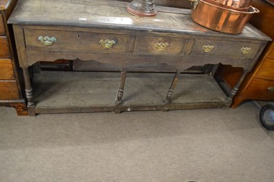 Lot 556 - An 18th Century oak dresser base with three...