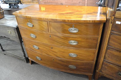 Lot 559 - A late Georgian mahogany bow front chest of...