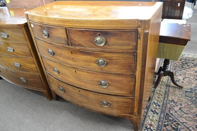 Lot 562 - A Georgian mahogany and inlaid bow front chest...