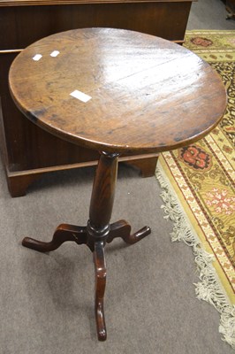 Lot 585 - A George III oak wine table with circular top,...