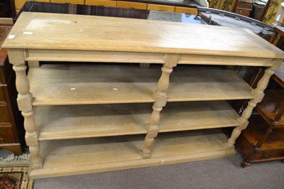 Lot 589 - A contemporary light oak shelf unit with...