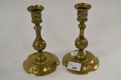 Lot 348 - A pair of late 17th/early 18th Century brass...