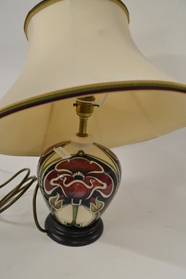 Lot 349 - A Moorcroft table lamp with shade, the...