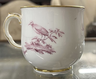 Lot 356 - A Chelsea porcelain cup painted in puce...