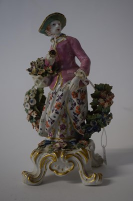 Lot 358 - A Bow Porcelain model of a flower seller on...