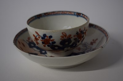 Lot 362 - A Lowestoft porcelain tea bowl and saucer with...