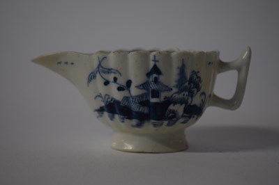 Lot 363 - A small Lowestoft cream boat with blue and...