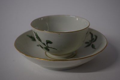 Lot 383 - A Worcester tea bowl and saucer painted in...