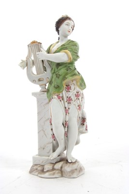 Lot 392 - A continental porcelain figure of a classical...