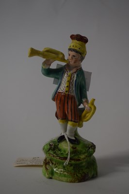 Lot 390 - An early Pearl ware figure of a showman,...