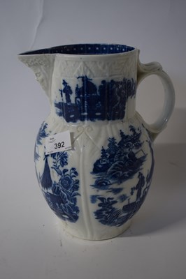 Lot 389 - A large Caughley fisherman pattern mask jug...