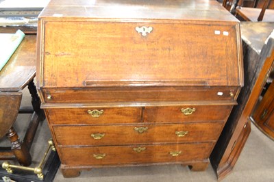 Lot 601 - An early Georgian oak bureau with full front...