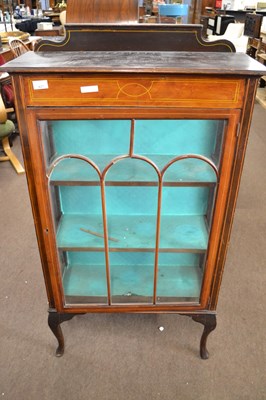 Lot 627 - An Edwardian inlaid china display cabinet on...